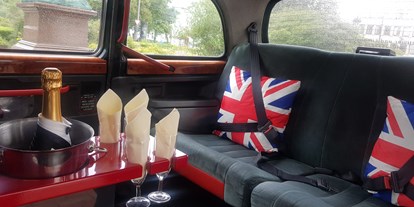 Hochzeitsauto-Vermietung - Lüneburger Heide - London Taxi in schneeweiss