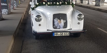 Hochzeitsauto-Vermietung - Lüneburger Heide - London Taxi in schneeweiss
