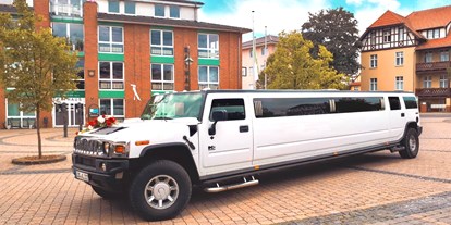 Hochzeitsauto-Vermietung - Antrieb: Gas - weiße Hummer H2 Stretchlimousine