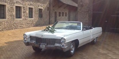 Hochzeitsauto-Vermietung - Marke: Cadillac - Nordrhein-Westfalen - Cadillac de Ville Hochzeitsauto Cabriolet - weiß Ruhrgebiet - Cadillac Weddingcar - Hochzeitsauto & Fotografie
